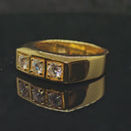 1.5cttw Flat Top Three-Stone Round Cut Moissanite Ring with 18K Gold Plating